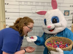 Easter Bunny handing out Easter eggs