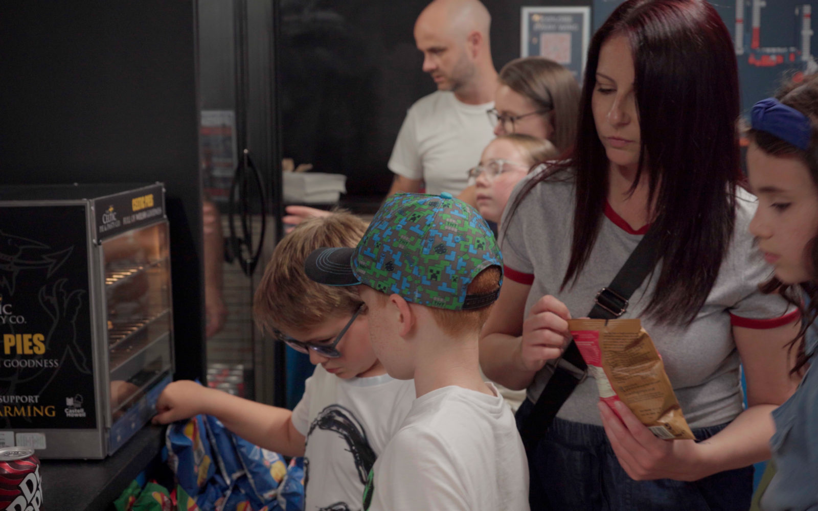 Family ordering lunch from Cafe